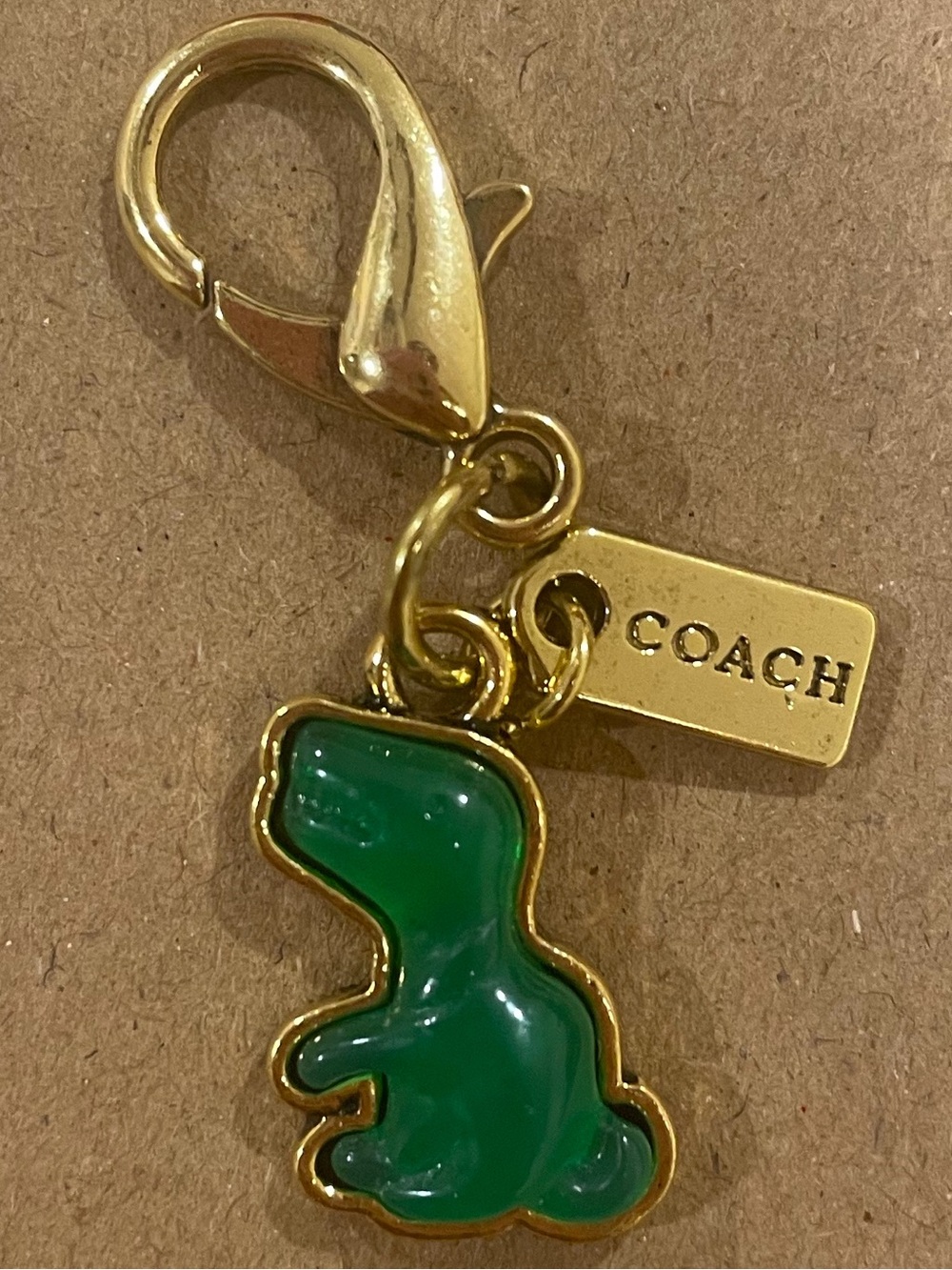 Coach Gold-tone Green Enamel Dinosaur Charm with Logo Tag